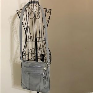 Grey leather like cross body bag, from Maurice’s